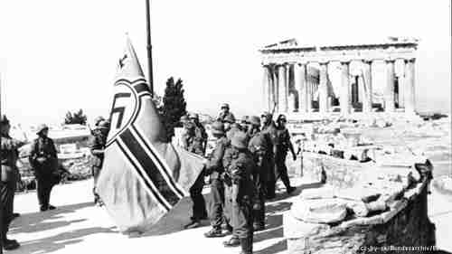 Nazi soldiers raising the swastika flag on the Acropolis