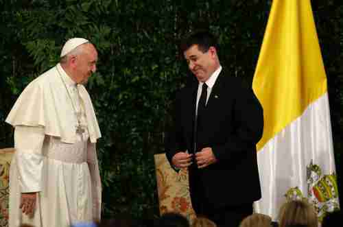 Pope Francis and Paraguay's President Horacio Cartes meet inside the Lpez Presidential Palace, in Asuncin, Paraguay on Friday.  The palace was named after president Carlos Antonio Lpez, the father of president Francisco Solano Lpez, who launched the War of the Triple Alliance (AP)