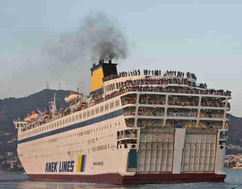 The ferry Eleftherios Venizelos with Syrian migrants on board leaves Lesbos for Greece's mainland