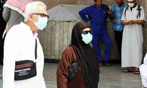 Pilgrims attending last year's Hajj wore nose and mouth masks (AFP)