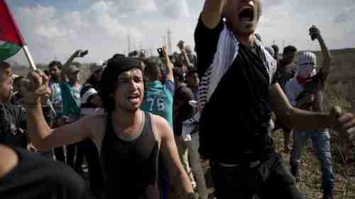 Palestinian protesters in Gaza on Friday (AP)