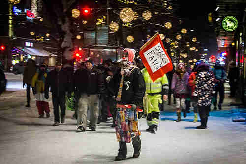 Clown carrying sign 'Sieg Fail' to make fun of Soldiers of Odin, whose leader is a neo-Nazi