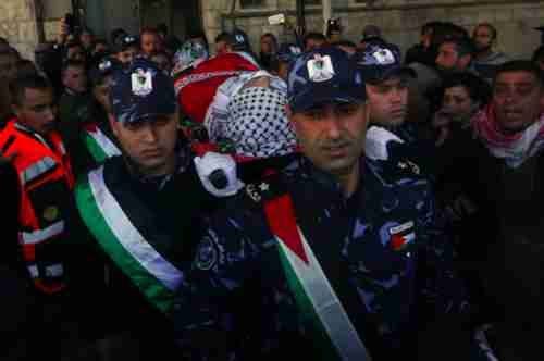 Thousands of people filled the streets for the funeral of Amjad Sukkari on Monday (AFP)