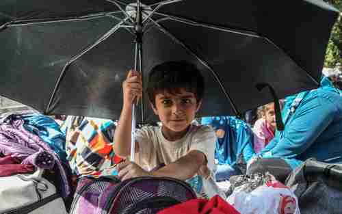 Unaccompanied child refugee last year in 'The Jungle' refugee camp in Calais, France (Getty)