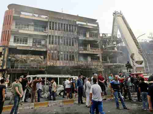 Aftermath of Sunday's bombing in Baghdad's Karrada district (EPA)