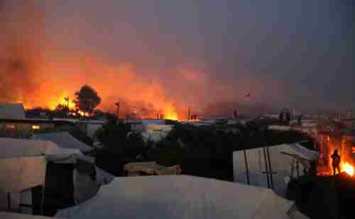 Calais 'Jungle' camp goes up in flames on Tuesday (AFP)