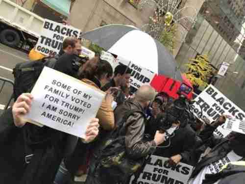 Supporters and opponents of Donald Trump outside Trump Tower in Manhattan on Wednesday (Boston Globe)