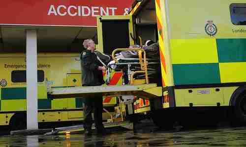 A patient in Britain is moved from an ambulance to an Accident & Emergency department.  (Getty)