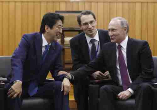 Shinzo Abe and Vladimir Putin at their meeting on Friday (AP)