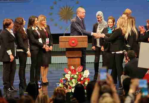 Campaign picture from last week, when Erdogan signed an emergency decree, live broadcast on television, allowing beauty salons to perform laser hair removal. (Cumhuriyet)