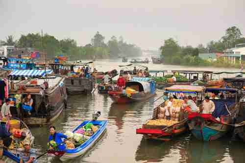 Floating marketplace in Mekong delta in Vietnam