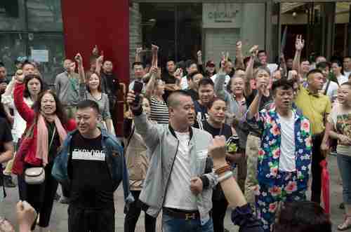 A rare street protest in Beijing against demolitions of migrant homes and businesses (Getty)