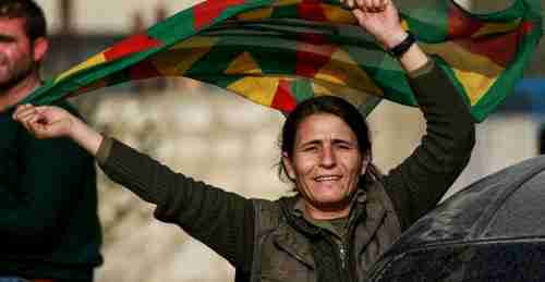 A Kurdish woman at an anti-Turkish rally near Afrin in norther Syria (AFP)