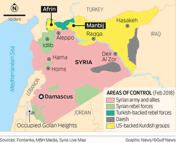 Turkish-backed FSA forces are fighting Kurds in Afrin, who will be helped by Kurdish forces in Manbij traveling to Afrin (AFP)