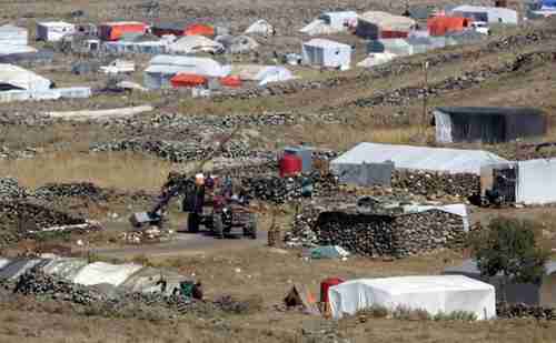 Displaced Syrians camp near border with Israel-controlled  Golan Heights (AFP)