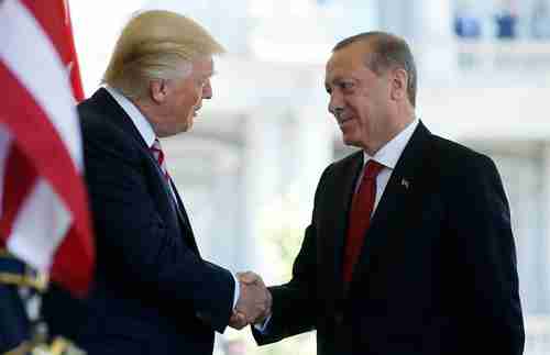 Presidents Trump and Erdogan shaking hands when they were still friendly (Reuters)