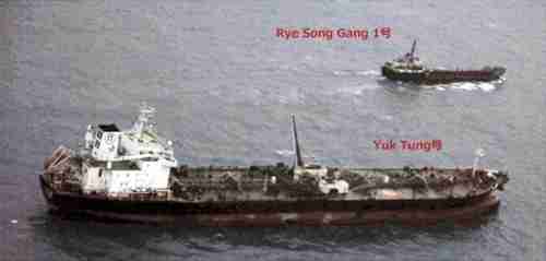 Japanese surveillance aircraft spots a Dominican-flagged Yuk Tung oil tanker after it transferred fuel to the North Korean-registered Rye Song tanker in the open South China Sea, in violation of sanctions.  (AP)