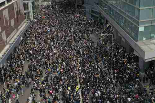 Protesters outside police headquarters in Hong Kong on Friday (SCMP)