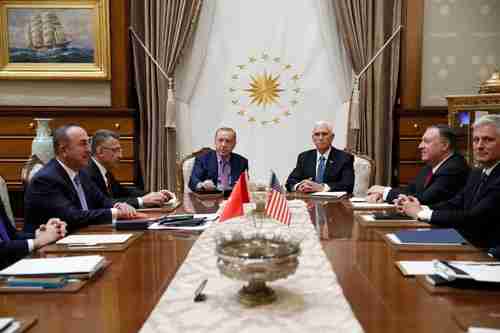 Thursday's negotiations in Ankara.  The Turks are on the left, and the Americans are on the right, led respectively by Tayyip Recep Erdogan and Mike Pence. (AP)