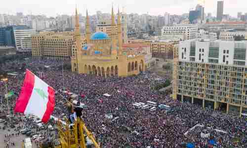 Protesters in front of the Muhammad al-Amin mosque in downtown Beirut, Lebanon, on Sunday. (EPA)