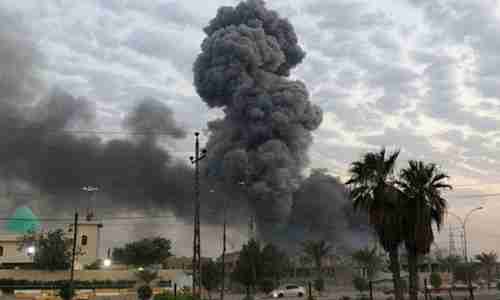 Plumes of smoke rise after an explosion at a military base in Iraq on August 12 (AP)