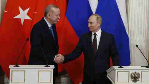 Recep Tayyip Erdogan and Vladimir Putin in Moscow on Thursday.  Erdogan is the lamb being led to slaughter.